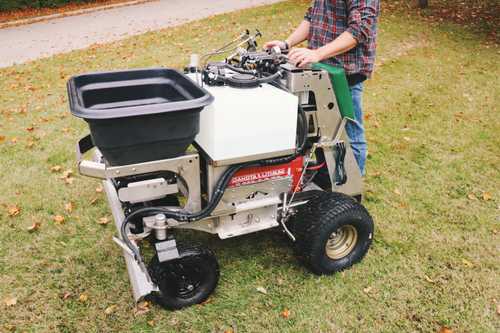 A photo of the Electric Spreader with a driver